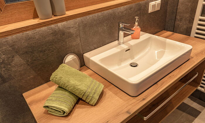 Bathroom with lots of wood